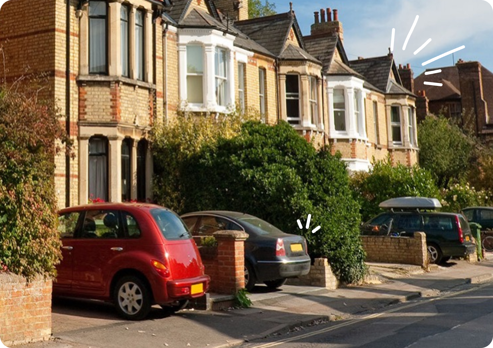 Cars parked in front of homes